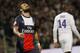 Paris Saint Germain's Ezequiel Lavezzi, left, reacts during their French League One soccer match against Lyon, in Lyon, central France, Sunday, April 13, 2014. (AP Photo/Laurent Cipriani)