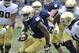 Notre Dame running back Greg Bryant heads up field during the Blue Gold game an NCAA football game marking the end of spring practice at Notre Dame Stadium Saturday April 12, 2014 in South Bend, Ind. (AP Photo/Joe Raymond)