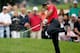 AKRON, OH - AUGUST 03: Tiger Woods hits out of the rough on the second hole during the final round of the World Golf Championships-Bridgestone Invitational at Firestone Country Club South Course on August 3, 2014 in Akron, Ohio. (Photo by Gregory Shamus/Getty Images)