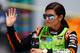 INDIANAPOLIS, IN - JULY 27: Danica Patrick, driver of the #10 GoDaddy Chevrolet, participates in pre-race ceremonies for the NASCAR Sprint Cup Series Crown Royal Presents The John Wayne Walding 400 at the Brickyard Indianapolis Motor Speedway on July 27, 2014 in Indianapolis, Indiana. (Photo by Sean Gardner/Getty Images)