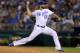 KANSAS CITY, MO - July 24: Wade Davis #17 of the Kansas City Royals throws in the eighth inning against the Cleveland Indians at Kauffman Stadium on July 24, 2014 in Kansas City, Missouri. (Photo by Ed Zurga/Getty Images)