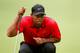 AKRON, OH - AUGUST 03: Tiger Woods lines up a putt on the first green during the final round of the World Golf Championships-Bridgestone Invitational at Firestone Country Club South Course on August 3, 2014 in Akron, Ohio. (Photo by Gregory Shamus/Getty Images)