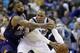 Dallas Mavericks forward Shawn Marion, right, keeps the ball from Phoenix Suns forward P.J. Tucker, left, during the first half of an NBA basketball game on Saturday, April 12, 2014, in Dallas. (AP Photo/LM Otero)