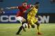 Manchester United Phil Jones (left) and Liverpool Raheem Sterling (31) battle for the ball during the finals of the Guinness International Championship Cup soccer match in Miami, Gardens, Fla., Monday, July 4, 2014. (AP Photo/J Pat Carter)