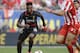 Liverpool FC forward Daniel Sturridge (15) looks to a pass against the Olympiacos during the first half of International Champions Cup soccer match in Chicago, Sunday, July 27, 2014. The Liverpool FC won 1-0. (AP Photo/Nam Y. Huh)