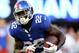 EAST RUTHERFORD, NJ - SEPTEMBER 15: David Wilson #22 of the New York Giants carries the ball in the second quarter against the Denver Broncos at MetLife Stadium on September 15, 2013 in East Rutherford, New Jersey. (Photo by Elsa/Getty Images)