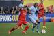 Liverpool midfielder Philippe Coutinho (10), left, challenges Manchester City midfielder Fernando (6) in the first half of a Guinness International Champions Cup soccer tournament match, Wednesday, July 30, 2014, at Yankee Stadium in New York. (AP Photo/Julie Jacobson)