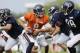 Chicago Bears quarterback Jimmy Clausen (8) looks to a pass during NFL football training camp at Olivet Nazarene University, Wednesday, July 30, 2014, in Bourbonnais, Ill. (AP Photo/Nam Y. Huh)