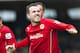 Cardiff City's Jordon Mutch celebrates after scoring against Fulham during their English Premier League soccer match at Craven Cottage stadium, in London, Saturday, Sept. 28, 2013. (AP Photo/Bogdan Maran)