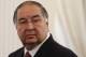 Uzbek-born Russian businessman Alisher Usmanov attends the meeting of Russian President Vladimir Putin and Crown Prince Sheik Mohammed bin Zayed Al Nahyan of the United Arab Emirates at the Novo-Ogaryovo state residence outside Moscow, on Thursday, Sept. 12, 2013. (AP Photo/Maxim Shemetov)
