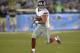 New York Giants running back Peyton Hillis (33) rushes against the Buffalo Bills during the Pro Football Hall of Fame exhibition NFL football game Sunday, Aug. 3, 2014, in Canton, Ohio. New York won 17-13. (AP Photo/David Richard)