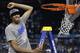 Kentucky forward Anthony Davis celebrates as he cuts the net after the NCAA Final Four tournament college basketball championship game Monday, April 2, 2012, in New Orleans. Kentucky beat Kansas 67-59. (AP Photo/David J. Phillip)