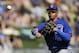 Chicago Cubs shortstop Javier Baez throws out Chicago White Sox's Marcus Semien at first in the fourth inning of a spring exhibition baseball game Friday, March 21, 2014, in Glendale, Ariz. (AP Photo/Mark Duncan)