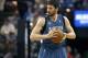 FILE - In this April 13, 2014, file photo, Minnesota Timberwolves forward Kevin Love gets ready to play the Sacramento Kings in Sacramento, Calif. A person with knowledge of the situation tells The Associated Press that the Timberwolves and Golden State Warriors have restarted trade talks for All-Star forward Kevin Love. (AP Photo/Steve Yeater, File)