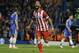 Atletico's Arda Turan celebrates after scoring his soda's 3rd goal during the Champions League semifinal second leg soccer match between Chelsea and Atletico Madrid at Stamford Bridge Stadium in London Wednesday, April 30, 2014. (AP Photo/Kirsty Wigglesworth)