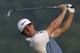 Rory McIlroy, of Northern Ireland, hits his tee shot on the eighth hole during a practice round for the PGA Championship golf tournament at Valhalla Golf Club on Wednesday, Aug. 6, 2014, in Louisville, Ky. The tournament is set to begin on Thursday. (AP Photo/David J. Phillip)