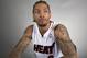 Miami Heat player Michael Beasley poses for photos during the team's media day, Monday, Sept. 30, 2013, in Miami. (AP Photo/J Pat Carter)