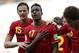 FILE - In this Sunday, June 22, 2014 file photo, Belgium's Divock Origi, center, celebrates with teammates Daniel Van Buyten, left, and Belgium's Axel Witsel, right, after Origi scored the opening goal during the group H World Cup soccer match between Belgium and Russia at the Maracana stadium in Rio de Janeiro, Brazil. Liverpool says it has signed Belgium striker Divock Origi from Lille and will loan him back to the French club for the whole of next season. The 19-year-old forward, who impressed during Belgium’s run to the quarterfinals of the World Cup, completed his transfer in the United States - where Liverpool is on a pre-season tour. The club said he had signed a “long-term deal” without giving details. British media put the transfer fee at 10 million pounds ($17 million). Origi, who joined Lille from Genk in 2010, says “Liverpool is one of the greatest clubs in the world and I’m very excited to be part of this great history.” (AP Photo/Ivan Sekretarev, file)