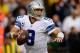 LANDOVER, MD - DECEMBER 22: Quarterback Tony Romo #9 of the Dallas Cowboys scrambles with the ball in the second half during an NFL game against the Washington Redskins at FedExField on December 22, 2013 in Landover, Maryland. (Photo by Patrick McDermott/Getty Images)