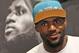 NBA star LeBron James speaks during a promotional event at a shopping district in Hong Kong as part of his China tour Wednesday, July 23, 2014. Earlier this month, James left the Miami Heat after four seasons and four trips to the NBA Finals and re-signed with the Cavaliers, where his career began. (AP Photo/Kin Cheung)