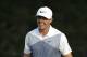 Rory McIlroy, of Northern Ireland, smiles on the seventh green during a practice round for the PGA Championship golf tournament at Valhalla Golf Club on Wednesday, Aug. 6, 2014, in Louisville, Ky. The tournament is set to begin on Thursday. (AP Photo/David J. Phillip)