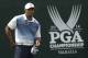 Tiger Woods stands on the first tee during a practice round for the PGA Championship golf tournament at Valhalla Golf Club on Wednesday, Aug. 6, 2014, in Louisville, Ky. The tournament is set to begin on Thursday. (AP Photo/David J. Phillip)