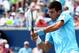 TORONTO, ON - AUGUST 06: Novak Djokovic of Serbia returns a shot to Gael Monfils of France during Rogers Cup at Rexall Centre at York University on August 6, 2014 in Toronto, Canada. (Photo by Ronald Martinez/Getty Images)