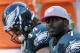 Philadelphia Eagles quarterback Michael Vick (7) and wide receiver Riley Cooper (14) sit on the bench after failing to get a first down in overtime during an NFL football game against the Detroit Lions on Sunday, Oct. 14, 2012, in Philadelphia. The Lions won 26-23 in overtime. (AP Photo/Michael Perez)