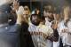 MILWAUKEE, WI - AUGUST 06: Pablo Sandoval #48 of the San Francisco Giants celebrates in the dugout after reaching on a single off the bat of Michael Morse in the top of the first inning against the Milwaukee Brewers at Miller Park on August 06, 2014 in Milwaukee, Wisconsin. (Photo by Mike McGinnis/Getty Images)