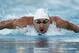 Michael Phelps swims in the 200-meter individual medley final during the Santa Clara International Grand Prix swim meet in Santa Clara, Calif., Sunday, June 22, 2014. Michael Phelps finished in third place. (AP Photo/Tony Avelar)