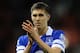 STOKE ON TRENT, ENGLAND - JANUARY 01: John Stones of Everton applauds the supporters following during the Barclays Premier League match between Stoke City and Everton at Britannia Stadium on January 01, 2014 in Stoke on Trent, England. (Photo by Chris Brunskill/Getty Images)