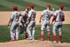The Cardinals celebrate after defeating the Padres on July 31.