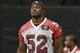 Arizona Cardinals' Ernie Sims walks on the field during the first day of NFL football training camp on Saturday, July 26, 2014, in Glendale, Ariz. (AP Photo/Ross D. Franklin)