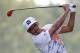 Rickie Fowler watches his tee shot on the first hole during the first round of the PGA Championship golf tournament at Valhalla Golf Club on Thursday, Aug. 7, 2014, in Louisville, Ky. (AP Photo/Mike Groll)