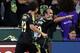 Aug 6, 2014; Portland, OR, USA; MLS All Stars midfielder Landon Donovan (10) of the Los Angeles Galaxy is congratulated by teammates after scoring a goal against Bayern Munich in the second half during the 2014 MLS All Star Game at Providence Park. Mandatory Credit: Jaime Valdez-USA TODAY Sports