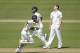 India's Ajinkya Rahane, left, and Virat Kohli add runs off a England's Chris Woakes, delivery during the third day of the third cricket test match of the series between England and India at The Ageas Bowl in Southampton, England, Tuesday, July 29, 2014. (AP Photo/Matt Dunham)
