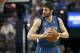 FILE - In this April 13, 2014, file photo, Minnesota Timberwolves forward Kevin Love gets ready to play the Sacramento Kings in Sacramento, Calif. A person with knowledge of the situation tells The Associated Press that the Timberwolves and Golden State Warriors have restarted trade talks for All-Star forward Kevin Love. (AP Photo/Steve Yeater, File)