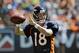 Denver Broncos quarterback Peyton Manning warms up before the start of the NFL Broncos Summer Scrimmage at Sports Authority Field at Mile High on Saturday, Aug. 2, 2014, in Denver. (AP Photo/Chris Schneider)