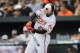 Baltimore Orioles' Nick Markakis connects for a single against the Seattle Mariners in the third inning of a baseball game Sunday, Aug. 3, 2014, in Baltimore. (AP Photo/Gail Burton)