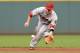 CINCINNATI, OH - JULY 29: Aaron Hill #2 of the Arizona Diamondbacks fields a ground ball in the third inning against the Cincinnati Reds at Great American Ball Park on July 29, 2014 in Cincinnati, Ohio. Cincinnati defeated Arizona 3-0. (Photo by Jamie Sabau/Getty Images)