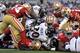 Baltimore Ravens running back Bernard Pierce (30) falls into the end zone for a touchdown in the first half of an NFL preseason football game against the San Francisco 49ers, Thursday, Aug. 7, 2014, in Baltimore. (AP Photo/Gail Burton)