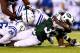 EAST RUTHERFORD, NJ - AUGUST 07: Running back Chris Ivory #33 of the New York Jets carries the ball against the Indianapolis Colts during a preseason game at MetLife Stadium on August 7, 2014 in East Rutherford, New Jersey. (Photo by Elsa/Getty Images)