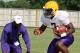 LSU running back coach Frank Wilson and freshman Leonard Fournette
