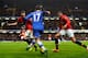 LONDON, ENGLAND - JANUARY 19: Eden Hazard of Chelsea is challenged by Phil Jones (L) and Chris Smalling (R) of Manchester United during the Barclays Premier League match between Chelsea and Manchester United at Stamford Bridge on January 19, 2014 in London, England. (Photo by Mike Hewitt/Getty Images)