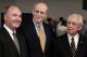 From left, Big Ten Commissioner Jim Delany, BCS executive director Bill Hancock and SEC Commissioner Mike Slive smile during an interview after a BCS presidential oversight committee meeting and media availability, Tuesday, June 26, 2012, in Washington. A committee of university presidents on Tuesday approved the BCS commissioners' plan for a four-team playoff to start in the 2014 season. (AP Photo/Alex Brandon)