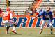 Apr 12, 2014; Gainesville, FL, USA; Florida Gators running back Valdez Showers (10) is defended by defensive back Marqui Hawkins (29) during the second half of the spring game at Ben Hill Griffin Stadium. Mandatory Credit: Rob Foldy-USA TODAY Sports