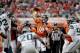 Denver Broncos quarterback Peyton Manning (18) throws against the Seattle Seahawks during the first half of an NFL preseason football game, Thursday, Aug. 7, 2014, in Denver. (AP Photo/Joe Mahoney)