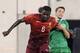 Portugal's William Carvalho, left, holds off Republic of Ireland's Wes Hoolahan during the first half of an international friendly soccer match Tuesday, June 10, 2014, in East Rutherford, N.J. Portugal won 5-1.(AP Photo/Bill Kostroun)