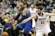 Dallas Mavericks' Shawn Marion, left, and Minnesota Timberwolves' Kevin Love race for the loose ball in the second half of an NBA basketball game, Friday, Nov. 8, 2013 in Minneapolis. The Timberwolves won 116-108. (AP Photo/Jim Mone)