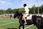 Notre Dame Coach Kelly Rolls Up to Practice on Horse